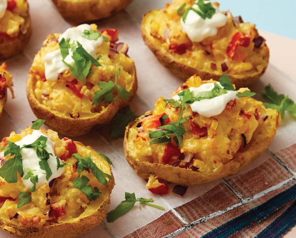 Cheesy baked stuffed potatoes e1597967530324 1024x823 1